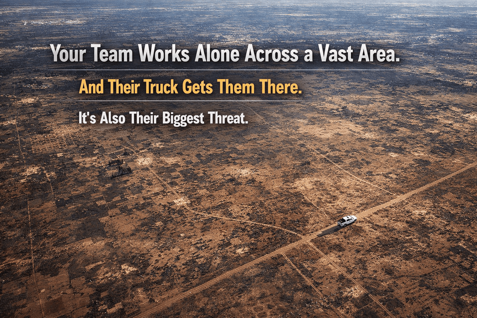 A light truck on a lease road across a vast field, the most dangerous routine exposure in upstream oil and gas operations