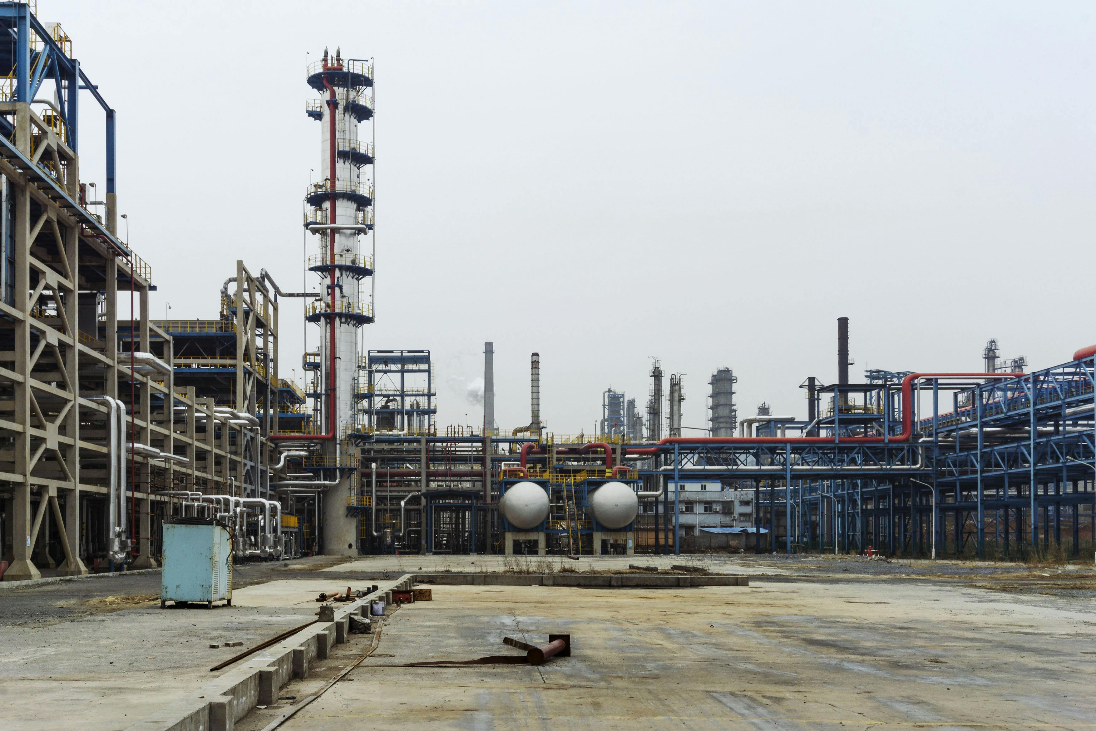 Midstream processing facility representing FlowSync hydraulic modeling automation