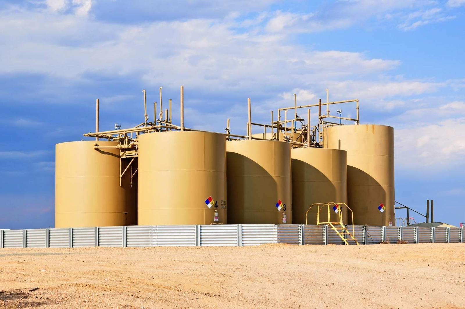 Industrial storage tanks at a processing facility